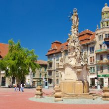 Timisoara featuring a square or plaza and a statue or sculpture